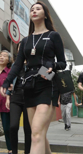 黑色包臀裙性感白皙长腿美女