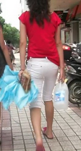 跟拍少妇屁股圆又翘