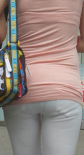 高挑OL白裤少妇内痕明显