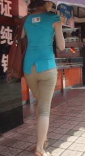 高跟黄裤翘臀少妇