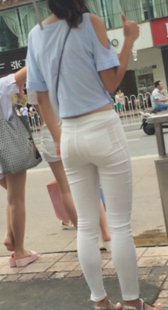 少妇性感白裤有点透明