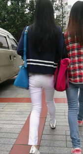 紧身白裤翘臀美少妇