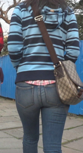 成熟丰满紧身牛仔少妇