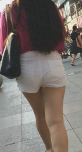 高腰白紧热裤少妇