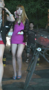 超短粉裙高跟少妇