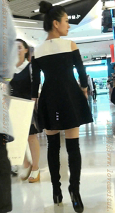 黑色高靴黑色超短裙的美腿少妇