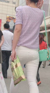 高挑长腿白紧裤少妇