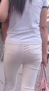 高跟白裤真会扭