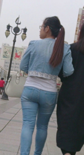 紧牛紧上衣少妇