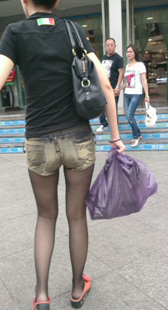 高挑黑丝热裤少妇