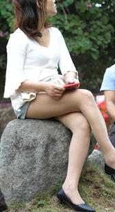 性感肉丝短裙白腿少妇