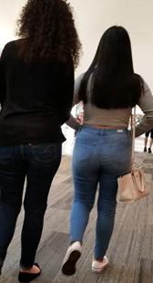 街拍蓝牛包臀长发洋妞