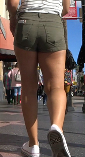 街拍绿短裤大妈臀