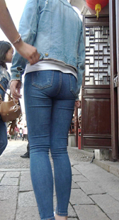 高挑翘臀牛仔裤少女